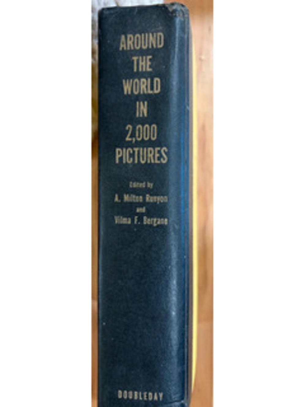 Vintage Hardcover Book “Around the World in 2,000 Pictures” by Runyon & Bergane